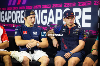 2023-09-14 - LAWSON Liam (nzl), Scuderia AlphaTauri AT04, VERSTAPPEN Max (ned), Red Bull Racing RB19, portrait during the 2023 Formula 1 Singapore Airlines Singapore Grand Prix, 15th round of the 2023 Formula One World Championship from September 15 to 17, 2023 on the Marina Bay Street Circuit, in Singapore - F1 - SINGAPORE GRAND PRIX 2023 - FORMULA 1 - MOTORS