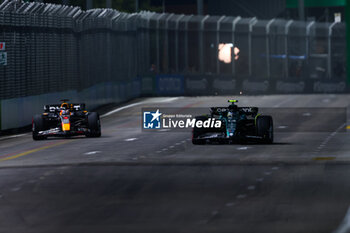 2023-09-15 - 14 ALONSO Fernando (spa), Aston Martin F1 Team AMR23, 01 VERSTAPPEN Max (nld), Red Bull Racing RB19, action during the 2023 Formula 1 Singapore Airlines Singapore Grand Prix, 15th round of the 2023 Formula One World Championship from September 15 to 17, 2023 on the Marina Bay Street Circuit, in Singapore - F1 - SINGAPORE GRAND PRIX 2023 - FORMULA 1 - MOTORS