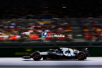 2023-09-15 - 22 TSUNODA Yuki (jap), Scuderia AlphaTauri AT04, action during the 2023 Formula 1 Singapore Airlines Singapore Grand Prix, 15th round of the 2023 Formula One World Championship from September 15 to 17, 2023 on the Marina Bay Street Circuit, in Singapore - F1 - SINGAPORE GRAND PRIX 2023 - FORMULA 1 - MOTORS
