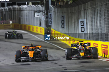 2023-09-17 - 04 NORRIS Lando (gbr), McLaren F1 Team MCL60, 01 VERSTAPPEN Max (nld), Red Bull Racing RB19, action during the 2023 Formula 1 Singapore Airlines Singapore Grand Prix, 15th round of the 2023 Formula One World Championship from September 15 to 17, 2023 on the Marina Bay Street Circuit, in Singapore - F1 - SINGAPORE GRAND PRIX 2023 - RACE - FORMULA 1 - MOTORS