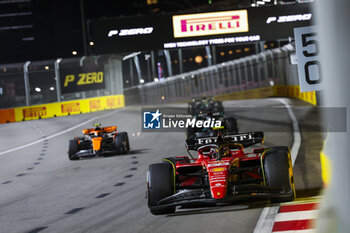 2023-09-17 - 55 SAINZ Carlos (spa), Scuderia Ferrari SF-23, action during the 2023 Formula 1 Singapore Airlines Singapore Grand Prix, 15th round of the 2023 Formula One World Championship from September 15 to 17, 2023 on the Marina Bay Street Circuit, in Singapore - F1 - SINGAPORE GRAND PRIX 2023 - RACE - FORMULA 1 - MOTORS