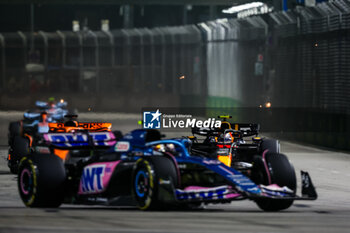 2023-09-17 - 11 PEREZ Sergio (mex), Red Bull Racing RB19, 10 GASLY Pierre (fra), Alpine F1 Team A523, action during the 2023 Formula 1 Singapore Airlines Singapore Grand Prix, 15th round of the 2023 Formula One World Championship from September 15 to 17, 2023 on the Marina Bay Street Circuit, in Singapore - F1 - SINGAPORE GRAND PRIX 2023 - RACE - FORMULA 1 - MOTORS