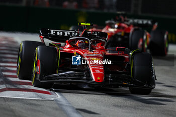 2023-09-17 - 55 SAINZ Carlos (spa), Scuderia Ferrari SF-23, 16 LECLERC Charles (mco), Scuderia Ferrari SF-23, action during the 2023 Formula 1 Singapore Airlines Singapore Grand Prix, 15th round of the 2023 Formula One World Championship from September 15 to 17, 2023 on the Marina Bay Street Circuit, in Singapore - F1 - SINGAPORE GRAND PRIX 2023 - RACE - FORMULA 1 - MOTORS
