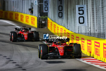 2023-09-17 - 55 SAINZ Carlos (spa), Scuderia Ferrari SF-23, 16 LECLERC Charles (mco), Scuderia Ferrari SF-23, action during the 2023 Formula 1 Singapore Airlines Singapore Grand Prix, 15th round of the 2023 Formula One World Championship from September 15 to 17, 2023 on the Marina Bay Street Circuit, in Singapore - F1 - SINGAPORE GRAND PRIX 2023 - RACE - FORMULA 1 - MOTORS