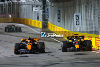 2023-09-17 - 04 NORRIS Lando (gbr), McLaren F1 Team MCL60, 01 VERSTAPPEN Max (nld), Red Bull Racing RB19, action during the 2023 Formula 1 Singapore Airlines Singapore Grand Prix, 15th round of the 2023 Formula One World Championship from September 15 to 17, 2023 on the Marina Bay Street Circuit, in Singapore - F1 - SINGAPORE GRAND PRIX 2023 - RACE - FORMULA 1 - MOTORS