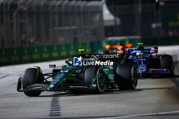 2023-09-17 - 14 ALONSO Fernando (spa), Aston Martin F1 Team AMR23, 10 GASLY Pierre (fra), Alpine F1 Team A523, action during the 2023 Formula 1 Singapore Airlines Singapore Grand Prix, 15th round of the 2023 Formula One World Championship from September 15 to 17, 2023 on the Marina Bay Street Circuit, in Singapore - F1 - SINGAPORE GRAND PRIX 2023 - RACE - FORMULA 1 - MOTORS