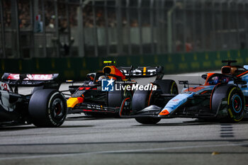 2023-09-17 - 11 PEREZ Sergio (mex), Red Bull Racing RB19, 23 ALBON Alexander (tha), Williams Racing FW45, action during the 2023 Formula 1 Singapore Airlines Singapore Grand Prix, 15th round of the 2023 Formula One World Championship from September 15 to 17, 2023 on the Marina Bay Street Circuit, in Singapore - F1 - SINGAPORE GRAND PRIX 2023 - RACE - FORMULA 1 - MOTORS