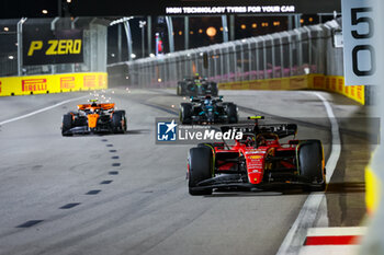 2023-09-17 - 55 SAINZ Carlos (spa), Scuderia Ferrari SF-23, 04 NORRIS Lando (gbr), McLaren F1 Team MCL60, 63 RUSSELL George (gbr), Mercedes AMG F1 Team W14, 44 HAMILTON Lewis (gbr), Mercedes AMG F1 Team W14, action during the 2023 Formula 1 Singapore Airlines Singapore Grand Prix, 15th round of the 2023 Formula One World Championship from September 15 to 17, 2023 on the Marina Bay Street Circuit, in Singapore - F1 - SINGAPORE GRAND PRIX 2023 - RACE - FORMULA 1 - MOTORS