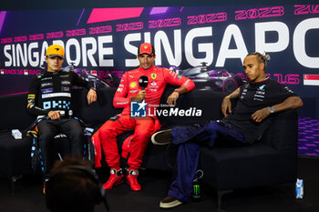 2023-09-17 - NORRIS Lando (gbr), McLaren F1 Team MCL60, SAINZ Carlos (spa), Scuderia Ferrari SF-23, HAMILTON Lewis (gbr), Mercedes AMG F1 Team W14, portrait during the 2023 Formula 1 Singapore Airlines Singapore Grand Prix, 15th round of the 2023 Formula One World Championship from September 15 to 17, 2023 on the Marina Bay Street Circuit, in Singapore - F1 - SINGAPORE GRAND PRIX 2023 - RACE - FORMULA 1 - MOTORS