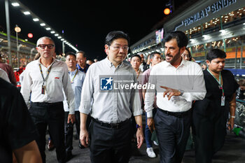 2023-09-17 - starting grid grille de depart BEN SULAYEM Mohammed (uae), President of the FIA, DOMENICALI Stefano (ita), Chairman and CEO Formula One Group FOG, portrait during the 2023 Formula 1 Singapore Airlines Singapore Grand Prix, 15th round of the 2023 Formula One World Championship from September 15 to 17, 2023 on the Marina Bay Street Circuit, in Singapore - F1 - SINGAPORE GRAND PRIX 2023 - RACE - FORMULA 1 - MOTORS