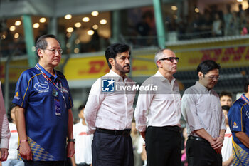 2023-09-17 - starting grid, national anthem, DOMENICALI Stefano (ita), Chairman and CEO Formula One Group FOG, BEN SULAYEM Mohammed (uae), President of the FIA, portrait during the 2023 Formula 1 Singapore Airlines Singapore Grand Prix, 15th round of the 2023 Formula One World Championship from September 15 to 17, 2023 on the Marina Bay Street Circuit, in Singapore - F1 - SINGAPORE GRAND PRIX 2023 - RACE - FORMULA 1 - MOTORS
