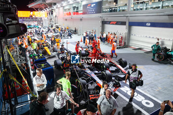 2023-09-17 - parc ferme 01 VERSTAPPEN Max (nld), Red Bull Racing RB19, 16 LECLERC Charles (mco), Scuderia Ferrari SF-23, during the 2023 Formula 1 Singapore Airlines Singapore Grand Prix, 15th round of the 2023 Formula One World Championship from September 15 to 17, 2023 on the Marina Bay Street Circuit, in Singapore - F1 - SINGAPORE GRAND PRIX 2023 - RACE - FORMULA 1 - MOTORS