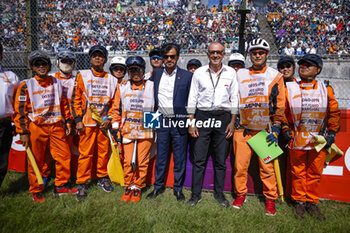 2023-09-24 - BEN SULAYEM Mohammed (uae), President of the FIA, DOMENICALI Stefano (ita), Chairman and CEO Formula One Group FOG, portrait, marshall during the 2023 Formula 1 Lenovo Japanese Grand Prix, 16th round of the 2023 Formula One World Championship from September 22 to 24, 2023 on the Suzuka International Racing Course, in Suzuka - F1 - JAPANESE GRAND PRIX 2023 - RACE - FORMULA 1 - MOTORS