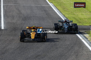 2023-09-24 - 04 NORRIS Lando (gbr), McLaren F1 Team MCL60, action 63 RUSSELL George (gbr), Mercedes AMG F1 Team W14, action during the 2023 Formula 1 Lenovo Japanese Grand Prix, 16th round of the 2023 Formula One World Championship from September 22 to 24, 2023 on the Suzuka International Racing Course, in Suzuka - F1 - JAPANESE GRAND PRIX 2023 - RACE - FORMULA 1 - MOTORS