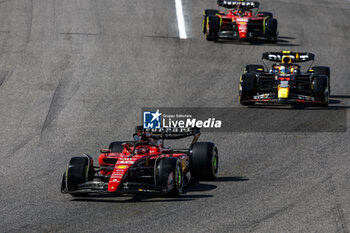 2023-09-24 - 16 LECLERC Charles (mco), Scuderia Ferrari SF-23, action 11 PEREZ Sergio (mex), Red Bull Racing RB19, action during the 2023 Formula 1 Lenovo Japanese Grand Prix, 16th round of the 2023 Formula One World Championship from September 22 to 24, 2023 on the Suzuka International Racing Course, in Suzuka - F1 - JAPANESE GRAND PRIX 2023 - RACE - FORMULA 1 - MOTORS