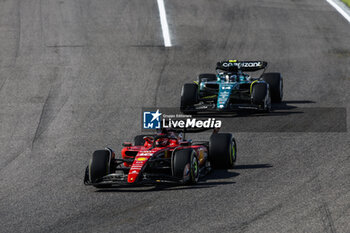 2023-09-24 - 16 LECLERC Charles (mco), Scuderia Ferrari SF-23, action 14 ALONSO Fernando (spa), Aston Martin F1 Team AMR23, action during the 2023 Formula 1 Lenovo Japanese Grand Prix, 16th round of the 2023 Formula One World Championship from September 22 to 24, 2023 on the Suzuka International Racing Course, in Suzuka - F1 - JAPANESE GRAND PRIX 2023 - RACE - FORMULA 1 - MOTORS