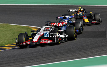 2023-09-24 - 20 MAGNUSSEN Kevin (den), Haas F1 Team VF-23 Ferrari, action 31 OCON Esteban (fra), Alpine F1 Team A523, action 11 PEREZ Sergio (mex), Red Bull Racing RB19, action during the 2023 Formula 1 Lenovo Japanese Grand Prix, 16th round of the 2023 Formula One World Championship from September 22 to 24, 2023 on the Suzuka International Racing Course, in Suzuka - F1 - JAPANESE GRAND PRIX 2023 - RACE - FORMULA 1 - MOTORS