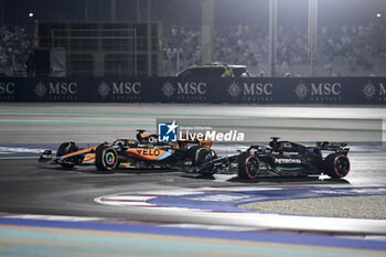 2023-10-07 - 81 PIASTRI Oscar (aus), McLaren F1 Team MCL60, action 63 RUSSELL George (gbr), Mercedes AMG F1 Team W14, action during the 2023 Formula 1 Qatar Grand Prix, 17th round of the 2023 Formula One World Championship from October 6 to 8, 2023 on the Lusail International Circuit, in Doha, Qatar - F1 - QATAR GRAND PRIX 2023 - FORMULA 1 - MOTORS