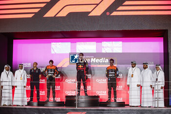 2023-10-08 - VERSTAPPEN Max (ned), Red Bull Racing RB19, portrait PIASTRI Oscar (aus), McLaren F1 Team MCL60, portrait NORRIS Lando (gbr), McLaren F1 Team MCL60, portrait podium during the 2023 Formula 1 Qatar Grand Prix, 17th round of the 2023 Formula One World Championship from October 6 to 8, 2023 on the Lusail International Circuit, in Doha, Qatar - F1 - QATAR GRAND PRIX 2023 - RACE - FORMULA 1 - MOTORS