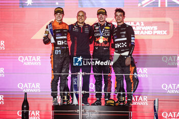 2023-10-08 - PIASTRI Oscar (aus), McLaren F1 Team MCL60, portrait VERSTAPPEN Max (ned), Red Bull Racing RB19, portrait NORRIS Lando (gbr), McLaren F1 Team MCL60, portrait podium during the 2023 Formula 1 Qatar Grand Prix, 17th round of the 2023 Formula One World Championship from October 6 to 8, 2023 on the Lusail International Circuit, in Doha, Qatar - F1 - QATAR GRAND PRIX 2023 - RACE - FORMULA 1 - MOTORS