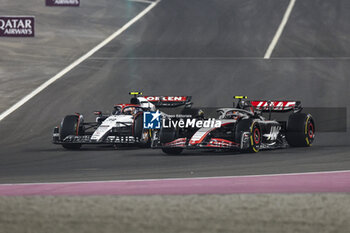 2023-10-08 - 22 TSUNODA Yuki (jap), Scuderia AlphaTauri AT04, action 27 HULKENBERG Nico (ger), Haas F1 Team VF-23 Ferrari, action during the 2023 Formula 1 Qatar Grand Prix, 17th round of the 2023 Formula One World Championship from October 6 to 8, 2023 on the Lusail International Circuit, in Doha, Qatar - F1 - QATAR GRAND PRIX 2023 - RACE - FORMULA 1 - MOTORS