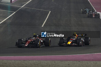2023-10-08 - 24 ZHOU Guanyu (chi), Alfa Romeo F1 Team Stake C43, action 11 PEREZ Sergio (mex), Red Bull Racing RB19, action during the 2023 Formula 1 Qatar Grand Prix, 17th round of the 2023 Formula One World Championship from October 6 to 8, 2023 on the Lusail International Circuit, in Doha, Qatar - F1 - QATAR GRAND PRIX 2023 - RACE - FORMULA 1 - MOTORS