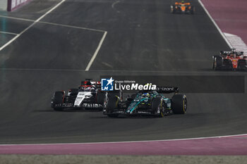 2023-10-08 - 40 LAWSON Liam (nzl), Scuderia AlphaTauri AT04, action 14 ALONSO Fernando (spa), Aston Martin F1 Team AMR23, action during the 2023 Formula 1 Qatar Grand Prix, 17th round of the 2023 Formula One World Championship from October 6 to 8, 2023 on the Lusail International Circuit, in Doha, Qatar - F1 - QATAR GRAND PRIX 2023 - RACE - FORMULA 1 - MOTORS