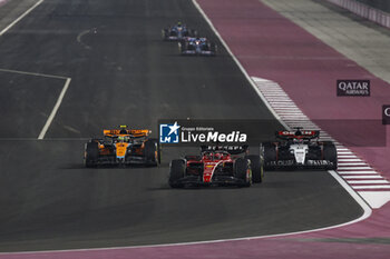 2023-10-08 - 16 LECLERC Charles (mco), Scuderia Ferrari SF-23, action 40 LAWSON Liam (nzl), Scuderia AlphaTauri AT04, action 04 NORRIS Lando (gbr), McLaren F1 Team MCL60, action during the 2023 Formula 1 Qatar Grand Prix, 17th round of the 2023 Formula One World Championship from October 6 to 8, 2023 on the Lusail International Circuit, in Doha, Qatar - F1 - QATAR GRAND PRIX 2023 - RACE - FORMULA 1 - MOTORS