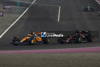 2023-10-08 - 81 PIASTRI Oscar (aus), McLaren F1 Team MCL60, action 77 BOTTAS Valtteri (fin), Alfa Romeo F1 Team Stake C43, action during the 2023 Formula 1 Qatar Grand Prix, 17th round of the 2023 Formula One World Championship from October 6 to 8, 2023 on the Lusail International Circuit, in Doha, Qatar - F1 - QATAR GRAND PRIX 2023 - RACE - FORMULA 1 - MOTORS