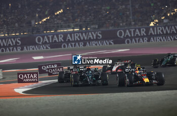 2023-10-08 - 11 PEREZ Sergio (mex), Red Bull Racing RB19, action 63 RUSSELL George (gbr), Mercedes AMG F1 Team W14, action during the 2023 Formula 1 Qatar Grand Prix, 17th round of the 2023 Formula One World Championship from October 6 to 8, 2023 on the Lusail International Circuit, in Doha, Qatar - F1 - QATAR GRAND PRIX 2023 - RACE - FORMULA 1 - MOTORS