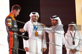 2023-10-08 - NORRIS Lando (gbr), McLaren F1 Team MCL60, portrait BEN SULAYEM Mohammed (uae), President of the FIA, portrait podium during the 2023 Formula 1 Qatar Grand Prix, 17th round of the 2023 Formula One World Championship from October 6 to 8, 2023 on the Lusail International Circuit, in Doha, Qatar - F1 - QATAR GRAND PRIX 2023 - RACE - FORMULA 1 - MOTORS