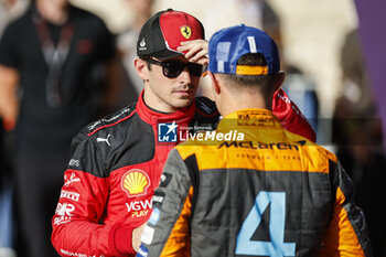 2023-10-21 - LECLERC Charles (mco), Scuderia Ferrari SF-23, portrait NORRIS Lando (gbr), McLaren F1 Team MCL60, portrait during the 2023 Formula 1 Lenovo United States Grand Prix, 18th round of the 2023 Formula One World Championship from October 20 to 22, 2023 on the Circuit of The Americas, in Austin, USA - F1 - US GRAND PRIX 2023 - FORMULA 1 - MOTORS