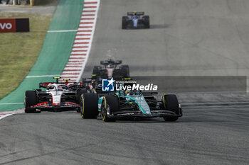 2023-10-22 - 14 ALONSO Fernando (spa), Aston Martin F1 Team AMR23, action 27 HULKENBERG Nico (ger), Haas F1 Team VF-23 Ferrari, action during the 2023 Formula 1 Lenovo United States Grand Prix, 18th round of the 2023 Formula One World Championship from October 20 to 22, 2023 on the Circuit of The Americas, in Austin, USA - F1 - US GRAND PRIX 2023 - FORMULA 1 - MOTORS