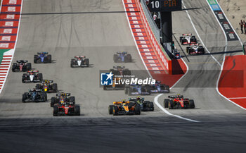 2023-10-22 - 04 NORRIS Lando (gbr), McLaren F1 Team MCL60, action, start of the race, depart with 16 LECLERC Charles (mco), Scuderia Ferrari SF-23 during the 2023 Formula 1 Lenovo United States Grand Prix, 18th round of the 2023 Formula One World Championship from October 20 to 22, 2023 on the Circuit of The Americas, in Austin, USA - F1 - US GRAND PRIX 2023 - RACE - FORMULA 1 - MOTORS