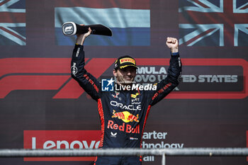 2023-10-22 - VERSTAPPEN Max (ned), Red Bull Racing RB19, portrait celebration victory podium during the 2023 Formula 1 Lenovo United States Grand Prix, 18th round of the 2023 Formula One World Championship from October 20 to 22, 2023 on the Circuit of The Americas, in Austin, USA - F1 - US GRAND PRIX 2023 - RACE - FORMULA 1 - MOTORS