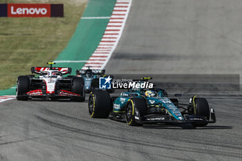 2023-10-22 - 14 ALONSO Fernando (spa), Aston Martin F1 Team AMR23, action 27 HULKENBERG Nico (ger), Haas F1 Team VF-23 Ferrari, action during the 2023 Formula 1 Lenovo United States Grand Prix, 18th round of the 2023 Formula One World Championship from October 20 to 22, 2023 on the Circuit of The Americas, in Austin, USA - F1 - US GRAND PRIX 2023 - RACE - FORMULA 1 - MOTORS