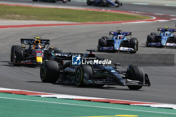 2023-10-22 - 63 RUSSELL George (gbr), Mercedes AMG F1 Team W14, action 11 PEREZ Sergio (mex), Red Bull Racing RB19, action during the 2023 Formula 1 Lenovo United States Grand Prix, 18th round of the 2023 Formula One World Championship from October 20 to 22, 2023 on the Circuit of The Americas, in Austin, USA - F1 - US GRAND PRIX 2023 - RACE - FORMULA 1 - MOTORS