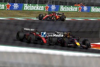 2023-10-22 - 16 LECLERC Charles (mco), Scuderia Ferrari SF-23, action 01 VERSTAPPEN Max (nld), Red Bull Racing RB19, action during the 2023 Formula 1 Lenovo United States Grand Prix, 18th round of the 2023 Formula One World Championship from October 20 to 22, 2023 on the Circuit of The Americas, in Austin, USA - F1 - US GRAND PRIX 2023 - RACE - FORMULA 1 - MOTORS