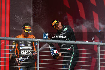 2023-10-22 - NORRIS Lando (gbr), McLaren F1 Team MCL60, portrait HAMILTON Lewis (gbr), Mercedes AMG F1 Team W14, portrait podium during the 2023 Formula 1 Lenovo United States Grand Prix, 18th round of the 2023 Formula One World Championship from October 20 to 22, 2023 on the Circuit of The Americas, in Austin, USA - F1 - US GRAND PRIX 2023 - RACE - FORMULA 1 - MOTORS