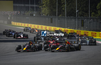 2023-10-29 - 01 VERSTAPPEN Max (nld), Red Bull Racing RB19, action, start of the race, depart, with 16 LECLERC Charles (mco), Scuderia Ferrari SF-23, and 11 PEREZ Sergio (mex), Red Bull Racing RB19, during the 2023 Formula 1 Grand Premio de la Ciudad de Mexico, 19th round of the 2023 Formula One World Championship from October 27 to 29, 2023 on the Autodromo Hermanos Rodriguez, in Mexico City, Mexico - F1 - MEXICO CITY GRAND PRIX 2023 - RACE - FORMULA 1 - MOTORS