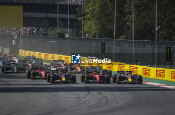 2023-10-29 - 01 VERSTAPPEN Max (nld), Red Bull Racing RB19, action, start of the race, depart, with 16 LECLERC Charles (mco), Scuderia Ferrari SF-23, and 11 PEREZ Sergio (mex), Red Bull Racing RB19, during the 2023 Formula 1 Grand Premio de la Ciudad de Mexico, 19th round of the 2023 Formula One World Championship from October 27 to 29, 2023 on the Autodromo Hermanos Rodriguez, in Mexico City, Mexico - F1 - MEXICO CITY GRAND PRIX 2023 - RACE - FORMULA 1 - MOTORS