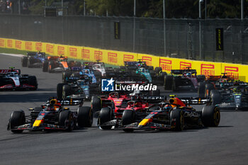 2023-10-29 - Start of the race: 01 VERSTAPPEN Max (nld), Red Bull Racing RB19, 16 LECLERC Charles (mco), Scuderia Ferrari SF-23, 11 PEREZ Sergio (mex), Red Bull Racing RB19, action during the 2023 Formula 1 Grand Premio de la Ciudad de Mexico, 19th round of the 2023 Formula One World Championship from October 27 to 29, 2023 on the Autodromo Hermanos Rodriguez, in Mexico City, Mexico - F1 - MEXICO CITY GRAND PRIX 2023 - RACE - FORMULA 1 - MOTORS