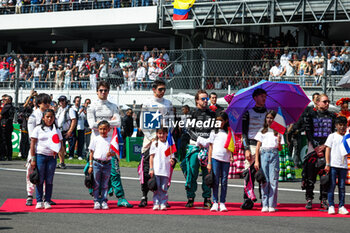 2023-10-29 - Drivers lining up for the National Anthem during the 2023 Formula 1 Grand Premio de la Ciudad de Mexico, 19th round of the 2023 Formula One World Championship from October 27 to 29, 2023 on the Autodromo Hermanos Rodriguez, in Mexico City, Mexico - F1 - MEXICO CITY GRAND PRIX 2023 - RACE - FORMULA 1 - MOTORS