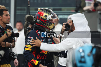 2023-11-26 - VERSTAPPEN Max (ned), Red Bull Racing RB19, portrait celebrates his victory during the 2023 Formula 1 Etihad Airways Abu Dhabi Grand Prix, 22th round of the 2023 Formula One World Championship from November 24 to 26, 2023 on the Yas Marina Circuit, in Abu Dhabi - F1 - ABU DHABI GRAND PRIX 2023 - RACE - FORMULA 1 - MOTORS
