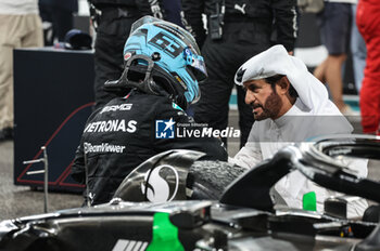2023-11-26 - RUSSELL George (gbr), Mercedes AMG F1 Team W14, portrait celebrates his third place with BEN SULAYEM Mohammed (uae), President of the FIA, portrait during the 2023 Formula 1 Etihad Airways Abu Dhabi Grand Prix, 22th round of the 2023 Formula One World Championship from November 24 to 26, 2023 on the Yas Marina Circuit, in Abu Dhabi - F1 - ABU DHABI GRAND PRIX 2023 - RACE - FORMULA 1 - MOTORS