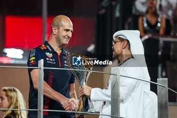 2023-11-26 - Red Bull Racing getting the constructors trophy on the podium during the 2023 Formula 1 Etihad Airways Abu Dhabi Grand Prix, 22th round of the 2023 Formula One World Championship from November 24 to 26, 2023 on the Yas Marina Circuit, in Abu Dhabi - F1 - ABU DHABI GRAND PRIX 2023 - RACE - FORMULA 1 - MOTORS