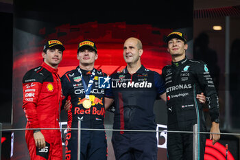2023-11-26 - LECLERC Charles (mco), Scuderia Ferrari SF-23, VERSTAPPEN Max (ned), Red Bull Racing RB19, RUSSELL George (gbr), Mercedes AMG F1 Team W14, portrait during the 2023 Formula 1 Etihad Airways Abu Dhabi Grand Prix, 22th round of the 2023 Formula One World Championship from November 24 to 26, 2023 on the Yas Marina Circuit, in Abu Dhabi - F1 - ABU DHABI GRAND PRIX 2023 - RACE - FORMULA 1 - MOTORS