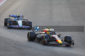 2023-11-26 - 11 PEREZ Sergio (mex), Red Bull Racing RB19, 10 GASLY Pierre (fra), Alpine F1 Team A523, action during the 2023 Formula 1 Etihad Airways Abu Dhabi Grand Prix, 22th round of the 2023 Formula One World Championship from November 24 to 26, 2023 on the Yas Marina Circuit, in Abu Dhabi - F1 - ABU DHABI GRAND PRIX 2023 - RACE - FORMULA 1 - MOTORS