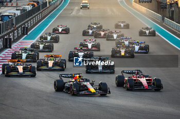 2023-11-26 - Start of the race: 01 VERSTAPPEN Max (nld), Red Bull Racing RB19, 16 LECLERC Charles (mco), Scuderia Ferrari SF-23, 04 NORRIS Lando (gbr), McLaren F1 Team MCL60, action, during the 2023 Formula 1 Etihad Airways Abu Dhabi Grand Prix, 22th round of the 2023 Formula One World Championship from November 24 to 26, 2023 on the Yas Marina Circuit, in Abu Dhabi - F1 - ABU DHABI GRAND PRIX 2023 - RACE - FORMULA 1 - MOTORS