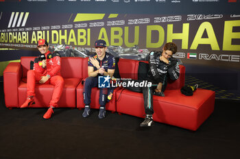 2023-11-26 - LECLERC Charles (mco), Scuderia Ferrari SF-23, portrait VERSTAPPEN Max (ned), Red Bull Racing RB19, portrait RUSSELL George (gbr), Mercedes AMG F1 Team W14, portrait press conference after race during the 2023 Formula 1 Etihad Airways Abu Dhabi Grand Prix, 22th round of the 2023 Formula One World Championship from November 24 to 26, 2023 on the Yas Marina Circuit, in Abu Dhabi - F1 - ABU DHABI GRAND PRIX 2023 - RACE - FORMULA 1 - MOTORS